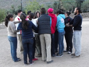 Team huddle of high school students in San Javier